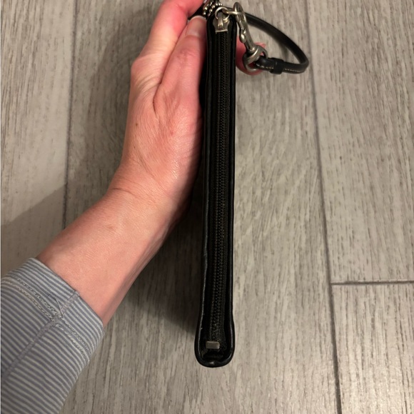 Coach wristlet in black leather. Hangtag present. EUC. - Picture 8 of 11